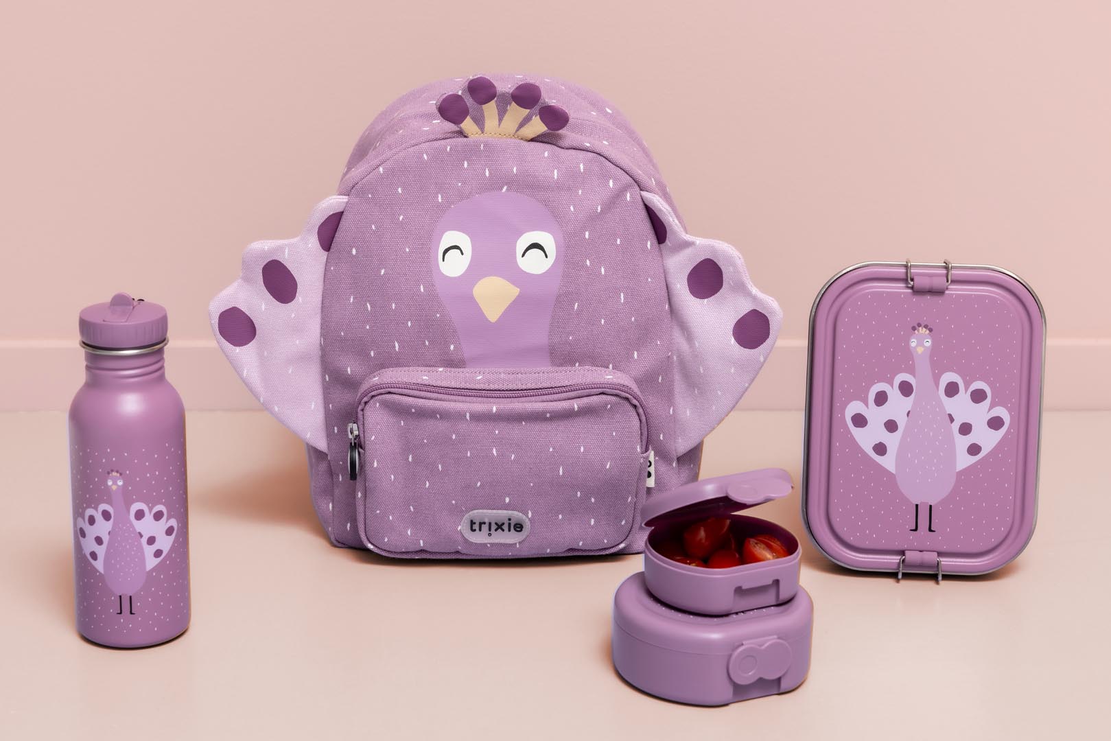 MOCHILA PEQUEÑA TRIXIE MRS. PEACOCK